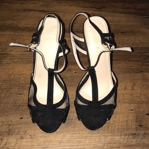 Black strappy heels with a mesh toe